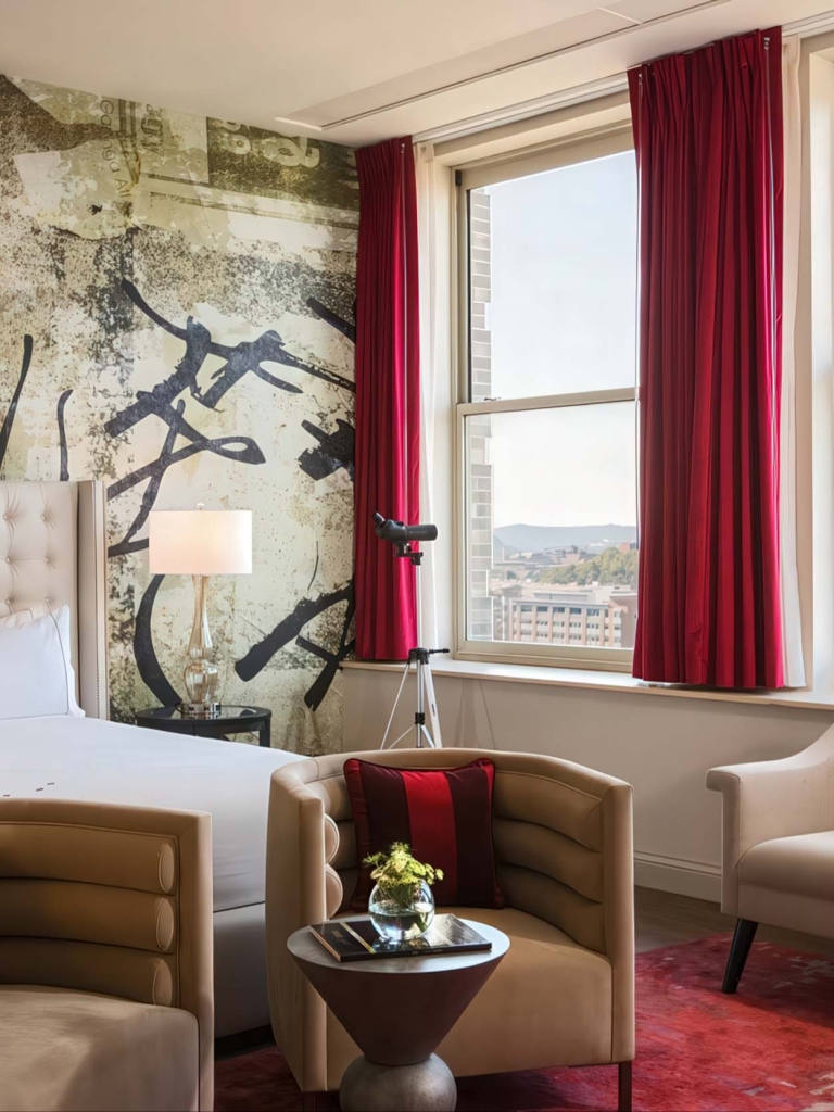 Concierge King Room with large windows and seating area